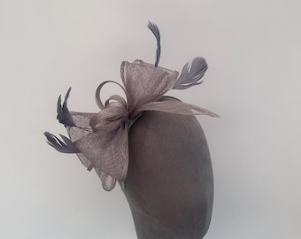 grey sinamay looped bow fascinator headband with added feathers
