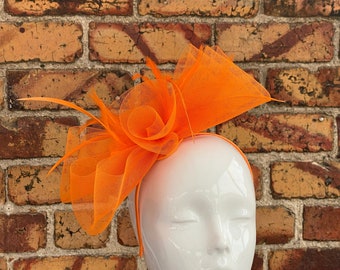 New bright orange mesh loop bow and flower fascinator with feathers headband and clip