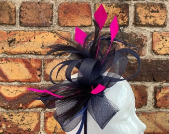 New navy blue loop bow fascinator with added cerise pink trimmed feathers headband and clip