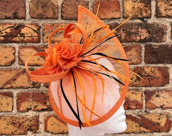 New orange and black sinamay teardrop fascinator with mesh flower and feathers
