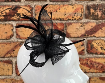New Black small flower sinamay fascinator clip and brooch with loops and feathers