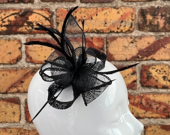 New Black small flower sinamay fascinator clip and brooch with loops and feathers