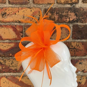 New bright orange loop bow fascinator with feathers headband and clip