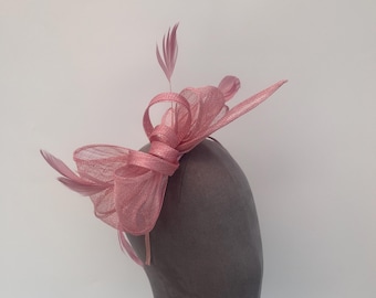 Pink sinamay looped bow fascinator headband with added feathers