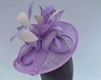 Lilac purple looped fascinator headband and clip with added cream feathers wedding hatinator races fascinator