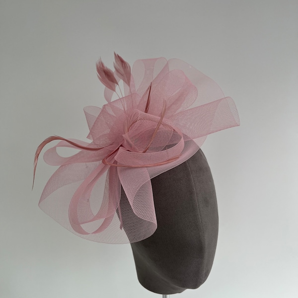 Blush pink wavy loop mesh fascinator with feathers