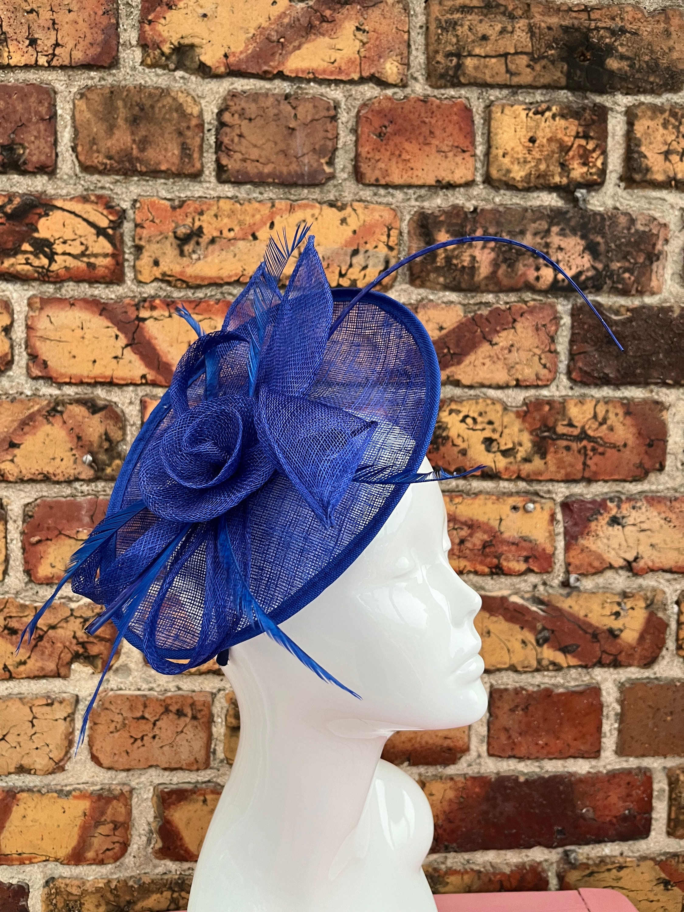 Blue Fascinator with an Upturned Brim Sinamay Loops Rosettes and Feathers Light Blue Sinamay Looped Bow Fascinator With Feather Flower  main image 4
