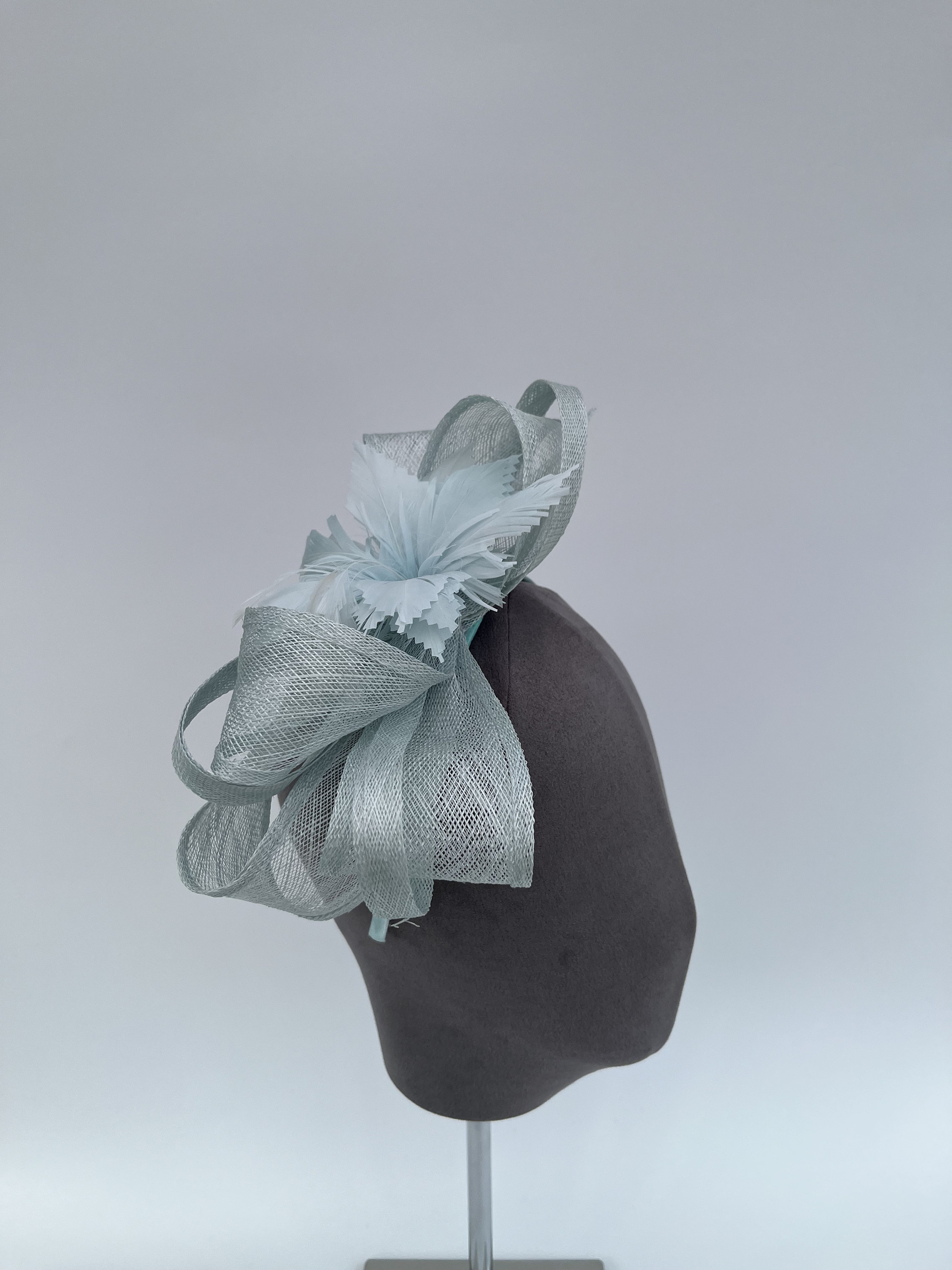 Light Blue Sinamay Looped Bow Fascinator With Feather Flower 