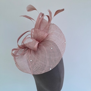 Light Blush Pink diamanté oval base fascinator headband and clip with a bow centrepiece and feathers