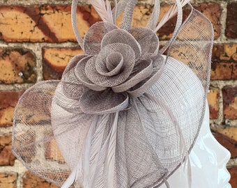 New grey sinamay flower fascinator headband with added feathers and sinamay loops