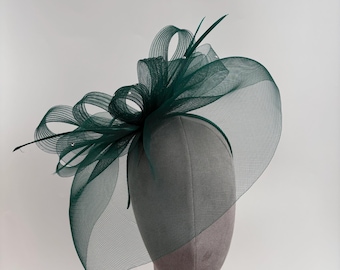 Dark Green round fascinator headband and clip with a diamanté loop design centre and feathers