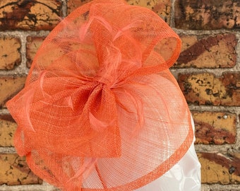 New orange sinamay round large bow and feather fascinator hatinator headband