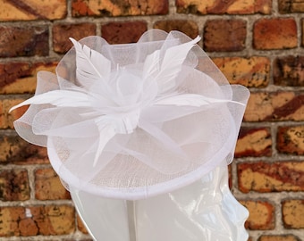 New white sinamay disc fascinator headband and clip with single mesh flower and feathers