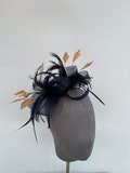 Navy Blue loop bow fascinator with added Gold diamond trimmed feathers headband and clip