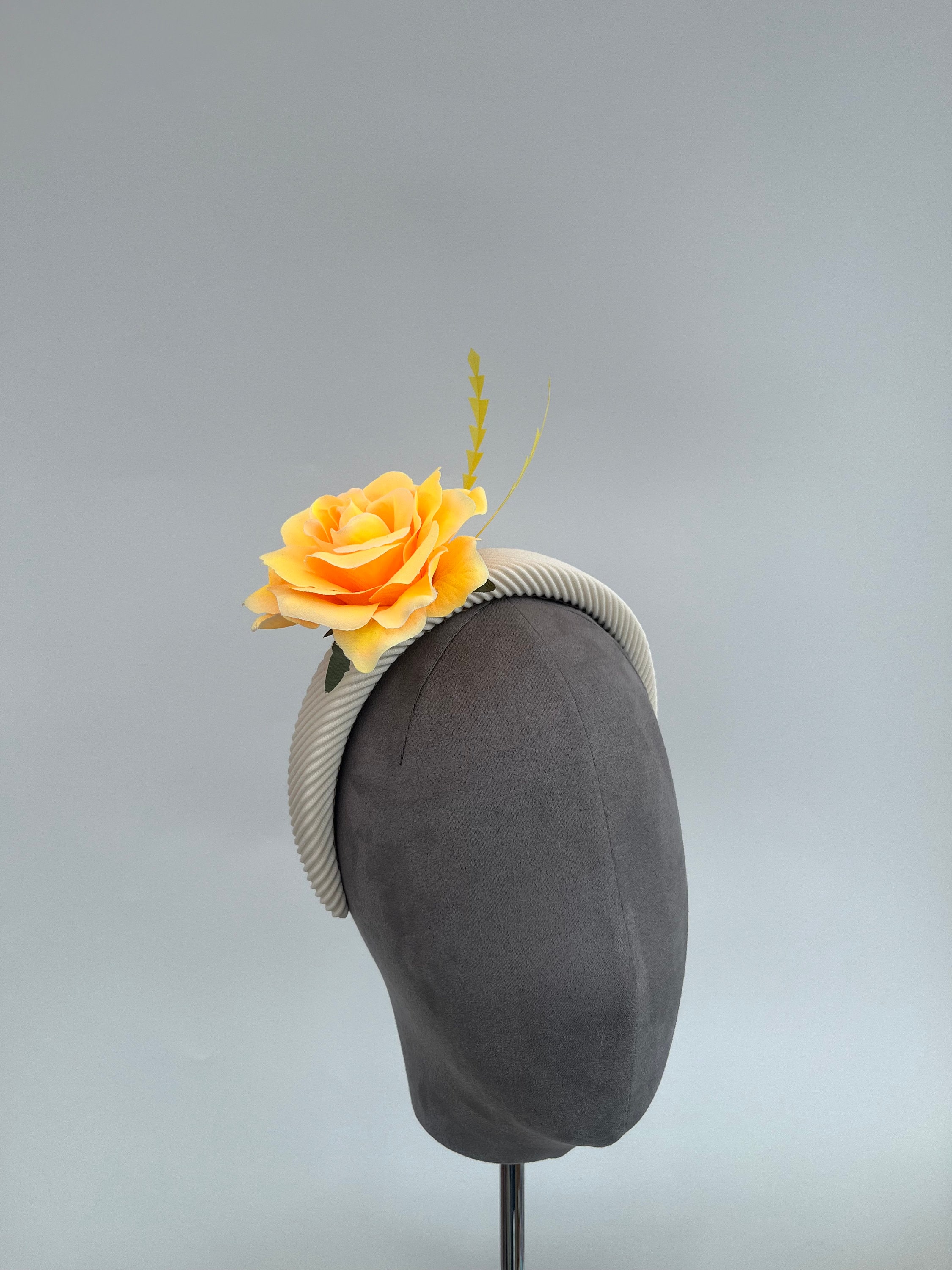 Yellow Flower Fascinator on a Cream Headband With Hand  display picture 2