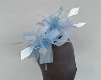 Baby Blue loop bow fascinator with added silver diamond trimmed feathers headband and clip