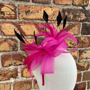 New bright pink cerise loop bow fascinator with added black trimmed feathers headband and clip