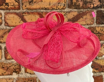 New pink sinamay round fascinator hatinator headband with sinamay and lace loop centrepiece with added feathers
