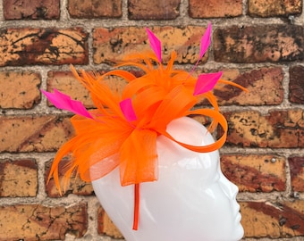 New bright orange loop bow fascinator headband and clip with orange and pink trimmed feathers