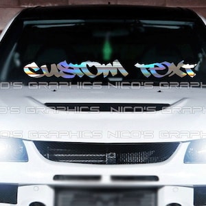 May include: A white car with a custom text decal on the windshield. The decal is iridescent and says "custom text".