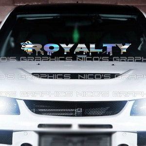 May include: A white car with a windshield decal that reads "ROYALTY" in a holographic, dripping font. The decal is above the car's hood, with the text "NICO'S GRAPHICS" repeated below the windshield.