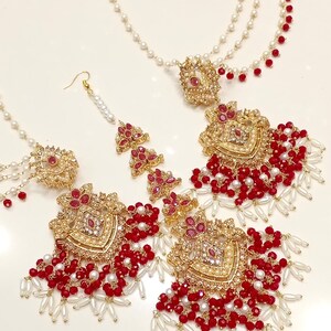 multistone choker, bridal neck jewelry, pearl gold adorns, desi wedding glam, ethnic bridal set, royal necklace art, cultural jewelry, pakistani wedding, heirloom choker set, ornate bridal wear, traditional neckpiece, gemstone party wear, timeless bridal look