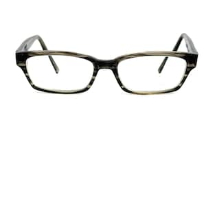 May include: Eyeglasses with a rectangular frame in a dark grey and light grey striped pattern. The frames are thick and bold, with clear lenses. The temples are thin and dark grey.