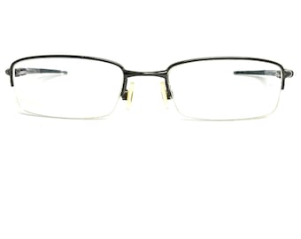 Oakley Rhinochaser OX3111-0152 Cement Rettangolare Half Wrap Gunmetal H14448