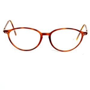 May include: A pair of brown tortoise shell eyeglasses with round lenses.