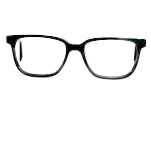 May include: Black and gray eyeglasses with a rectangular frame. The glasses have a subtle marbled pattern and clear lenses. The frames are thick and sturdy, suitable for everyday wear.