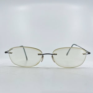 Silhouette Eyeglasses Titan Silver Blue Rimless Frame H7211