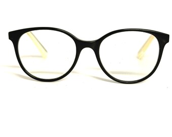 Montatura per occhiali da vista Sonia Rykiel Paris SR7359, colore nero e crema, misura 51-18-135, prodotta in Francia.