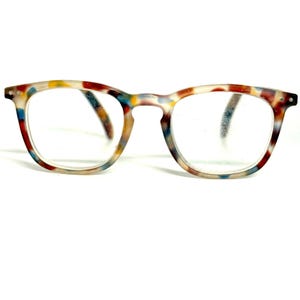 May include: Eyeglasses with a colorful speckled pattern in red, yellow, blue, and white. The frames have a classic square shape. The lenses are clear. The eyeglasses are set against a white background.