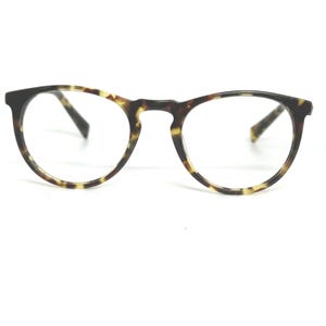 May include: Round eyeglasses with a tortoiseshell pattern. The frames are brown and tan with clear lenses. The glasses have a keyhole bridge and a classic, timeless design.