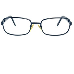 May include: Black rectangular eyeglasses with a thin metal frame.