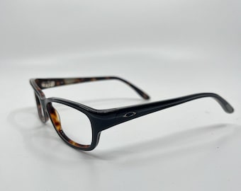 Oakley Sunglasses Frames unkown model black and brown tortoise frame only H6648