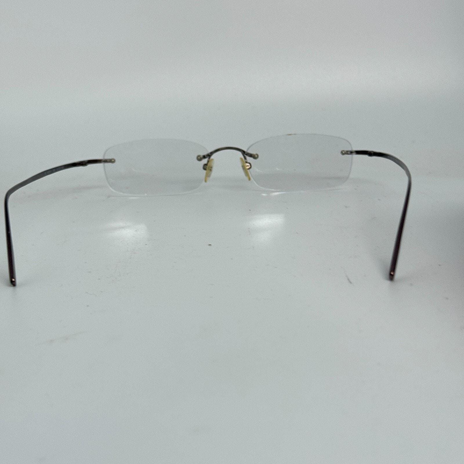 Nautica Eyeglasses Frames N7811 006 Titanium Brown Rimless 51-19-140 H17726‎ Nautica Eyeglasses Frames N7811 006 Titanium Brown Rimless  main image 4