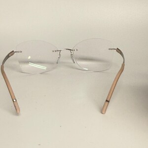 Suntan Rimless Frame Silhouette 5555 70 7000 Rimless Eyeglasses Frames Silver Tan 19 145 ...