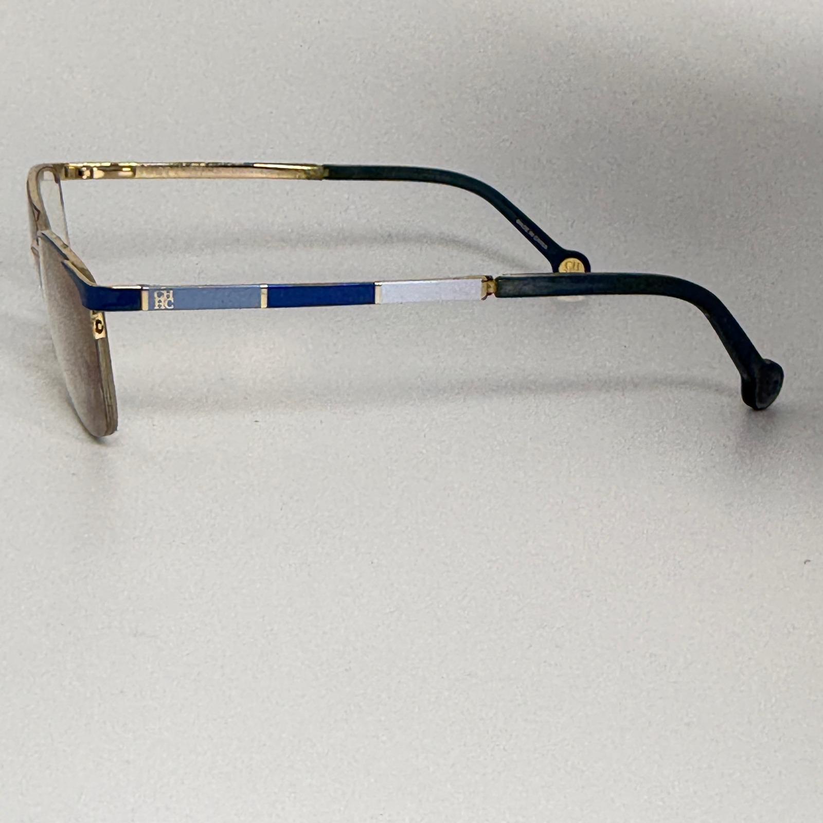 Carolina Herrera VHE677K Eyeglass Frames Only Blue Gold COL 0D99 52-17-140 Carolina Herrera HER 0234 RHL Optical Frame Gold Black - eye  main image 2