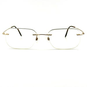 CHARMANT 186 Titanium Gold Rimless Eyeglasses Frame H13360