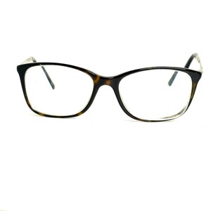 May include: Full-rim eyeglasses featuring a dark brown and black tortoiseshell pattern on the frame. The glasses have a rectangular shape with rounded edges, clear lenses, and thin, dark-colored temples extending from the sides of the frame.