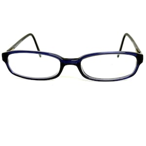 May include: A pair of eyeglasses featuring a rectangular frame in a deep translucent blue color. The glasses have thin, dark-colored temples that curve downward at the ends, a bridge connecting the two lenses, and clear, non-tinted lenses.