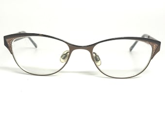 Kliik Denmark 469 Montatura per occhiali da vista a occhi di gatto con glitter marroni 48-17-140 Uomo Donna