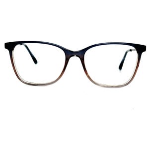 May include: A pair of black and brown eyeglasses with a square frame.