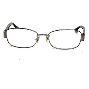 May include: Rectangular eyeglasses with a thin, dark gray metal frame. The lenses are clear, and the temples are black. The glasses have a minimalist design, suitable for everyday wear. The overall aesthetic is modern and understated.