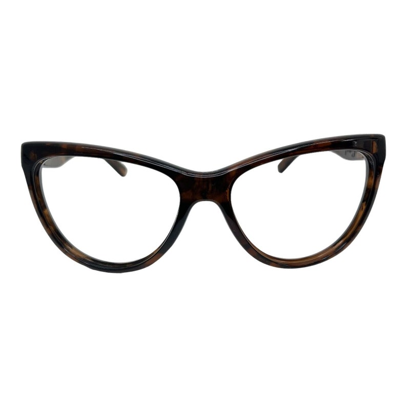 May include: Tortoise shell cat eye glasses with clear lenses.