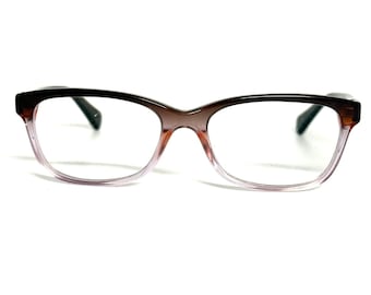 Gafas Coach HC 6089 5401 con lentes degradadas en tonos morado y marrón, montura 51-16-135.