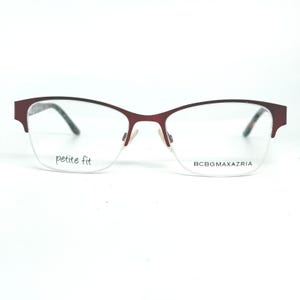 May include: Burgundy-colored eyeglasses with a half-rim design. The frames have a rectangular shape with a subtle curve at the top. The text "petite fit" is printed on the left lens, and "BCBGMAXAZRIA" is printed on the right lens.