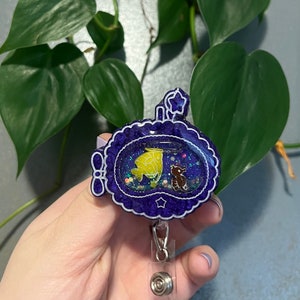 Purple Submarine shaker badge reel