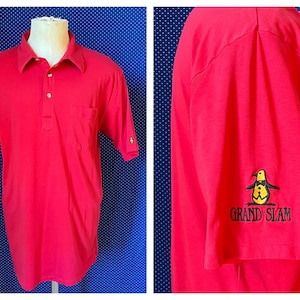 Vintage 1980’s Munsingwear Penguin polo shirt with large sleeve embroidery, large